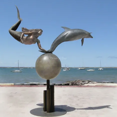 Scultura da giardino statua in bronzo a grandezza naturale con sirena e delfino