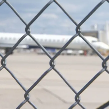 Airport security chain link fence