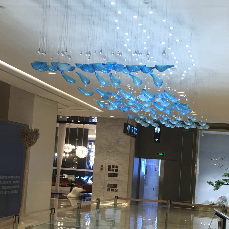 Iluminación personalizada de hotel colgante de cristal azul