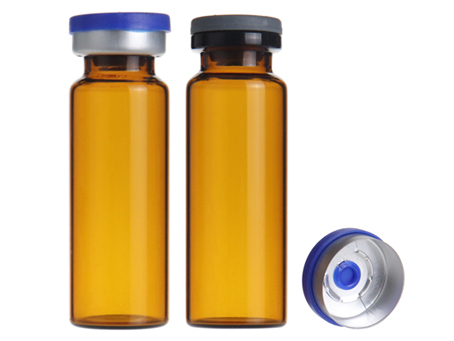 Why is amber glass commonly used as a container in pharmaceutical preparations?