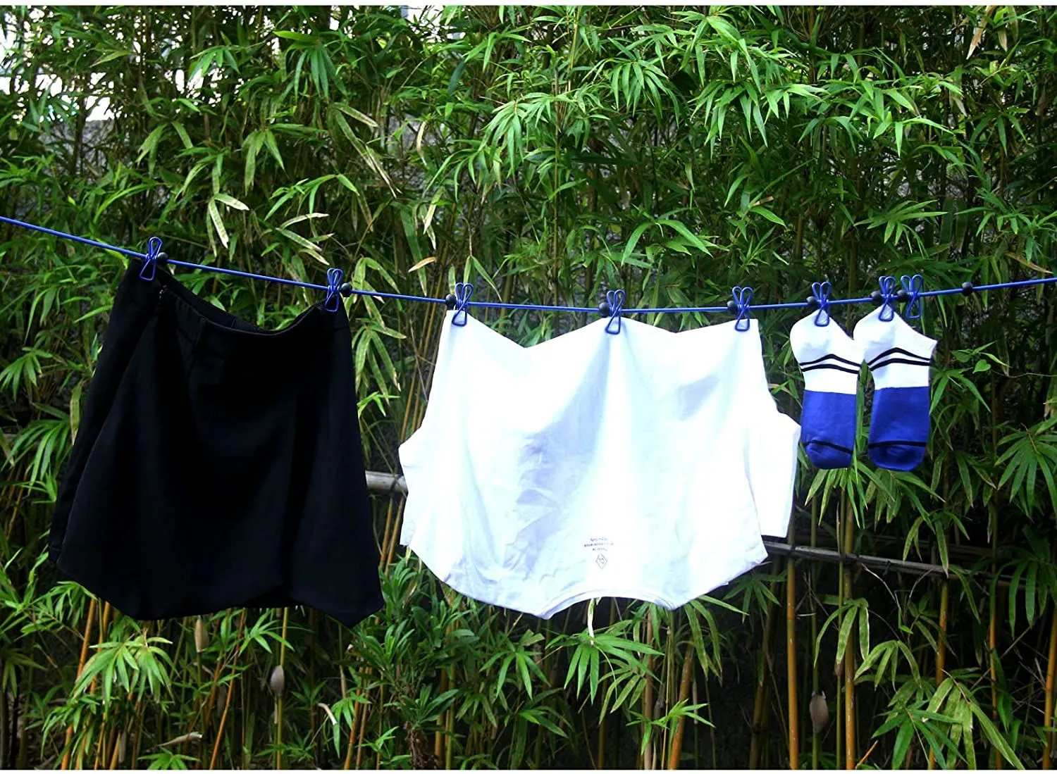 Portable Travel  adjustable clotheslines with 12pcs clothespins is easy to hang on.jpg
