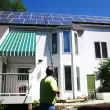 Solar panel cleaning brush with water fed pole
