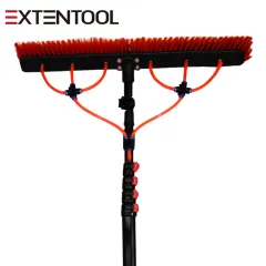 Solar panel cleaning brush with water fed pole