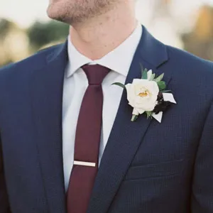 Navy suit with plain color man tie