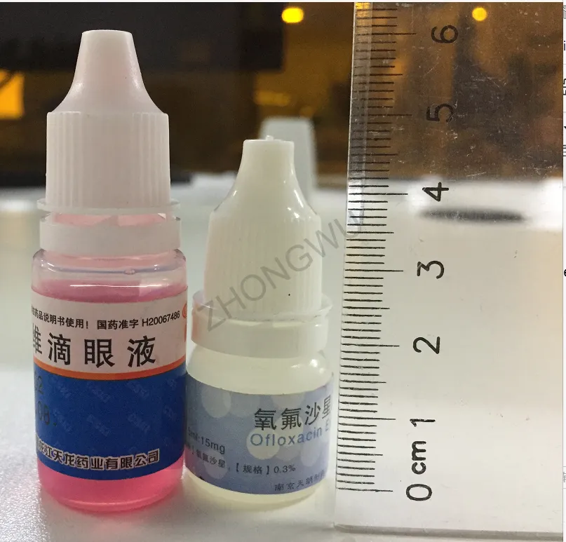 checkweigher with small bottle of eye drops