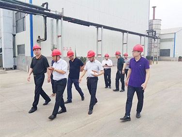 City leaders inspect the factory