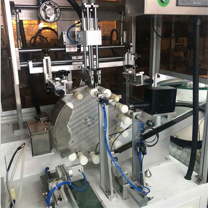 Fully automatic screen printing machine for tubes round bottles