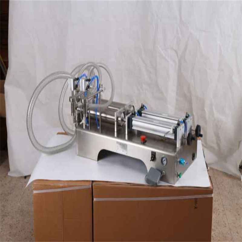 Tabletop self priming dual head piston filling machine