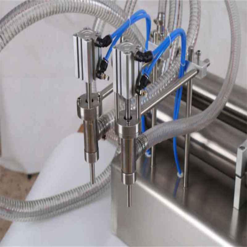 Tabletop self priming dual head piston filling machine