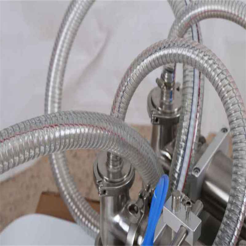 Tabletop self priming dual head piston filling machine