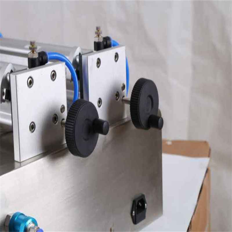 Tabletop self priming dual head piston filling machine