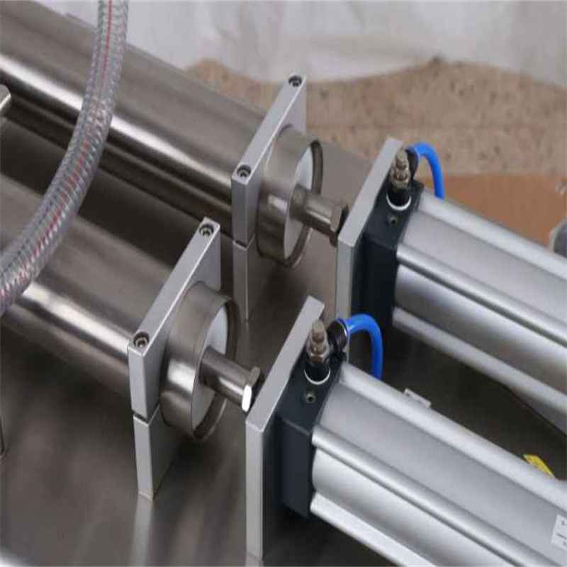 Tabletop self priming dual head piston filling machine