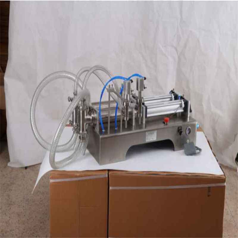 Tabletop self priming dual head piston filling machine