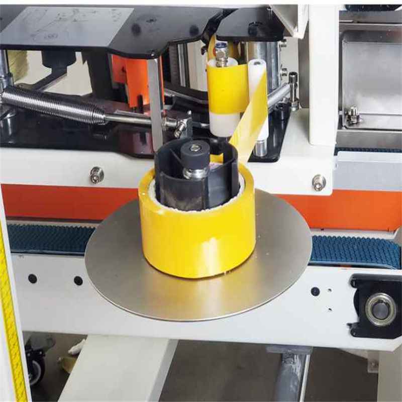 Automatic foam box top sides taping machine