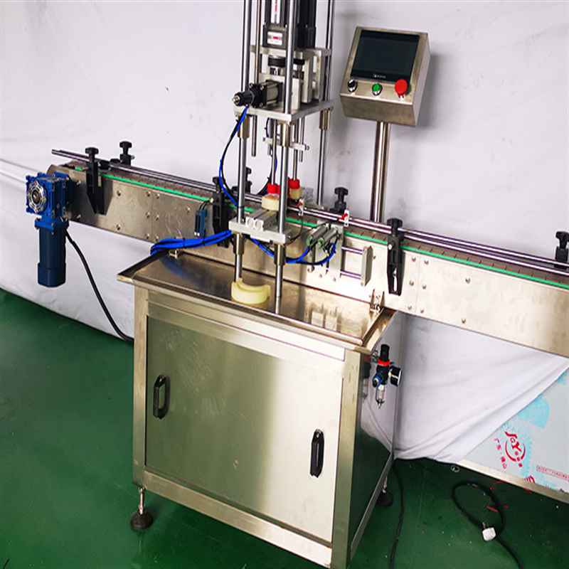 Automatic inline capping machine with bowl caps feeder