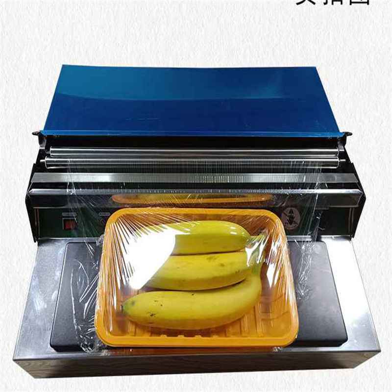 Manual tray cling film wrapping machine