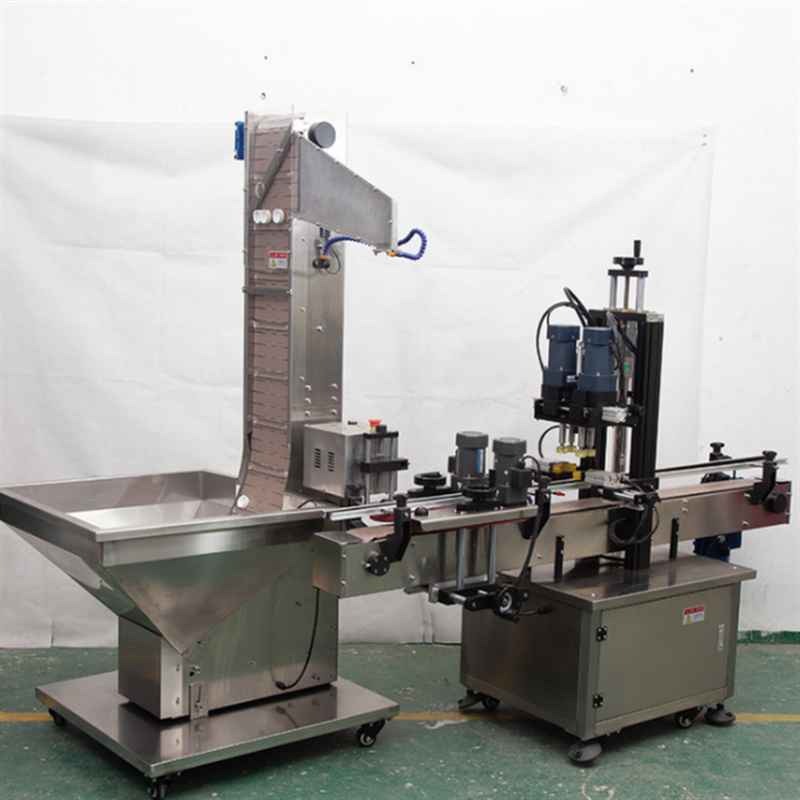 Automatic spindle capping machine