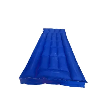 Upgrade your sleeping arrangements with a durable and resilient rubberized inflatable mattress.