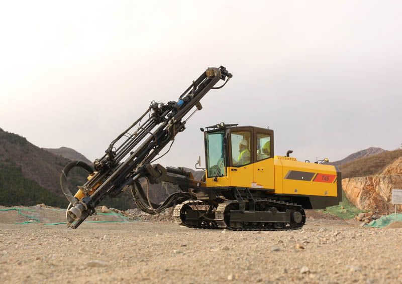 The bulldozer, a symbol of power and efficiency, dominates the construction site with its imposing presence and unmatched capability to tackle even the toughest terrain.