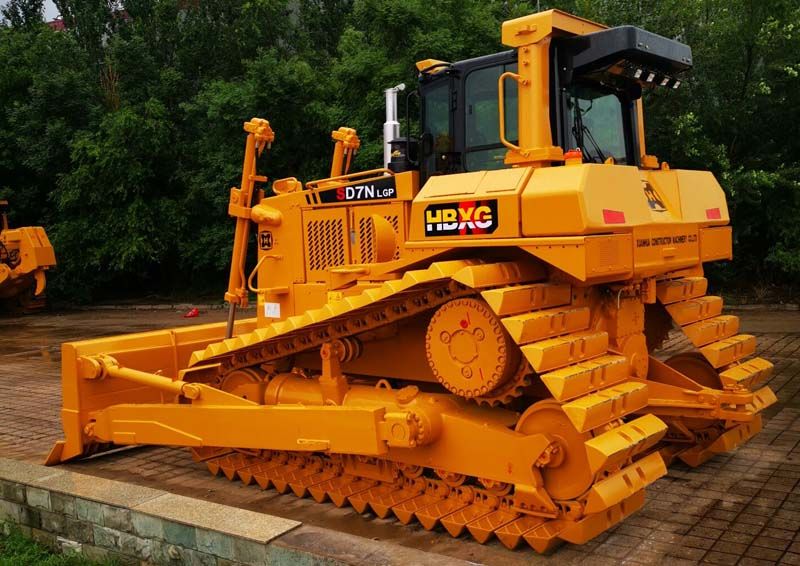 The road roller, a key player in road construction, compacts soil, gravel, and asphalt to create smooth, durable surfaces. Its heavy drums exert powerful force, ensuring roads withstand the test of time and traffic.
