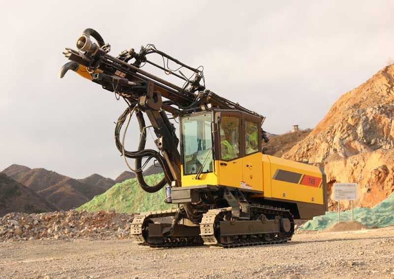 A powerful machine used for moving large amounts of earth, ideal for clearing land and creating level surfaces.
