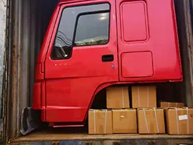 Был доставлен полный контейнер запчастей, запчасти для грузовиков, запчасти для строительной техники и кабина HW76.