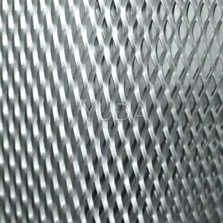 Expanded metal is a type of sheet metal which has been cut and stretched to form a regular pattern (often diamond-shaped) of metal mesh-like material. It is commonly used for fences and grates, and as metallic lath to support plaster or stucco.