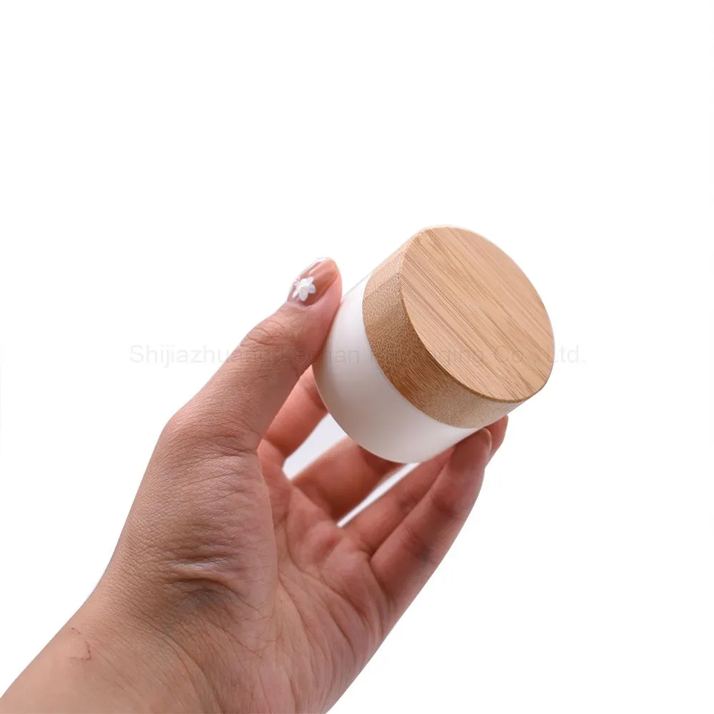 white plastic cream jar with wooden lids