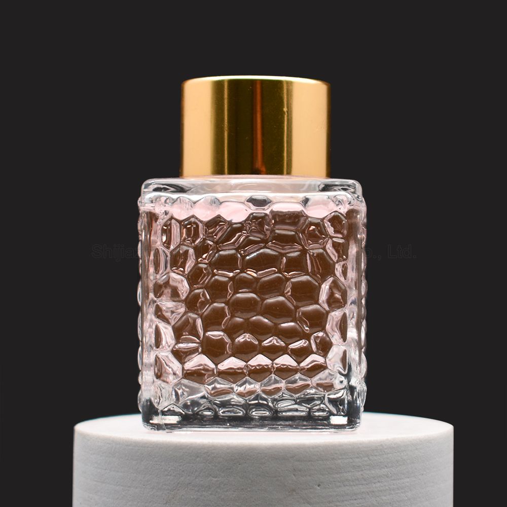 Patterned glass aromatherapy perfume bottle