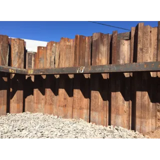 Sheet pile walls are constructed by driving prefabricated sections into the ground. Soil conditions may allow these sections to be vibrated into the ground rather than driven with a hammer.
