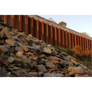 A steel sheet piling retaining wall is a retaining wall constructed to retain earth, water or any other fill material.