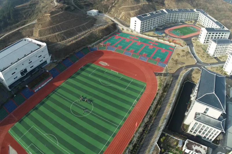 Eight Basketball Courts With Modular Flooring Tiles In A Middle School