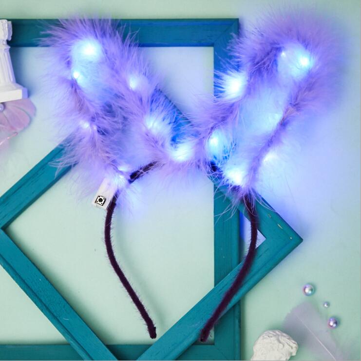 Reizendes geführtes Großhandelsblitzen leuchten Federkaninchenohr-Haarbandspielwaren im Stirnband der heißen Artkinder der szenischen Stelle