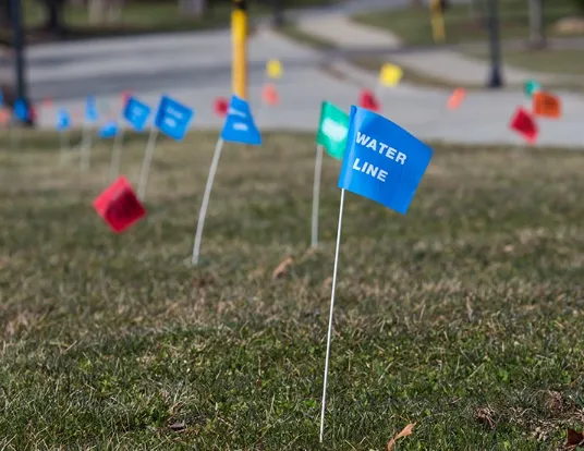 Colored Flags and Underground Utility Markings Keep Everyone Safe
