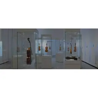 Museum display cases must fulfill two different functions at the same time: to protect and preserve the objects they display, and to enable visitors to enjoy them.