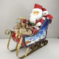 Noël Père Noël assis sur un traîneau