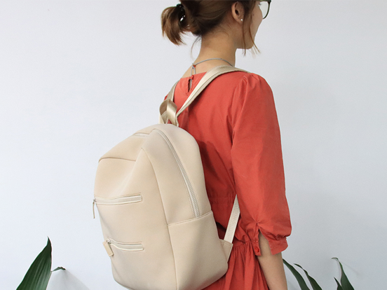 What are the features of a neoprene backpack?