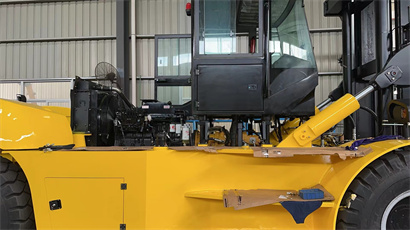 busy workshop with full of forklift and telehandler