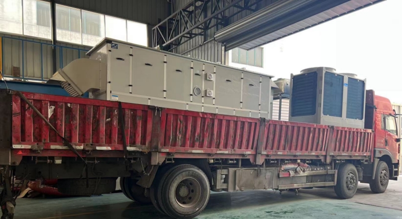 The outdoor weather-proof type desiccant air handling unit installed with desiccant rotor dehumidifier and it's outdoor condensing unit are transported to project site by a truck