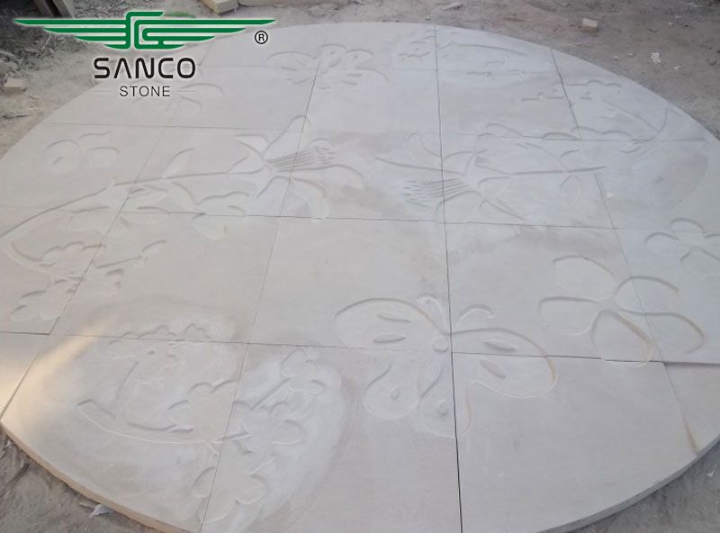 Round carved paving stone