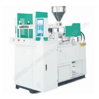 Vertical injection molding equipment is designed with open clamps and rotary tables.