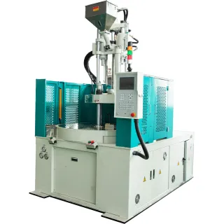 The vertical injection molding machine has a fast response time for precision molding.