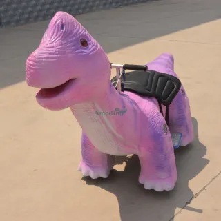 Purple coin-operated cute dinosaur ride