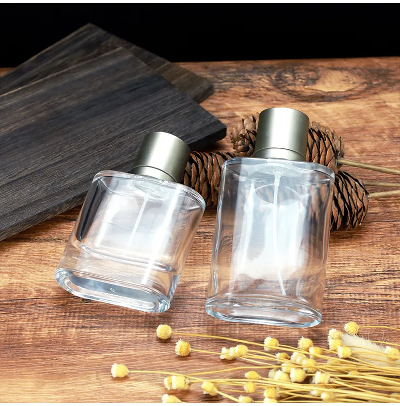 Flat round glass perfume bottle