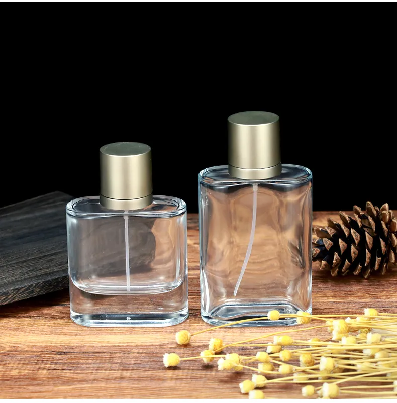 Flat round glass perfume bottle