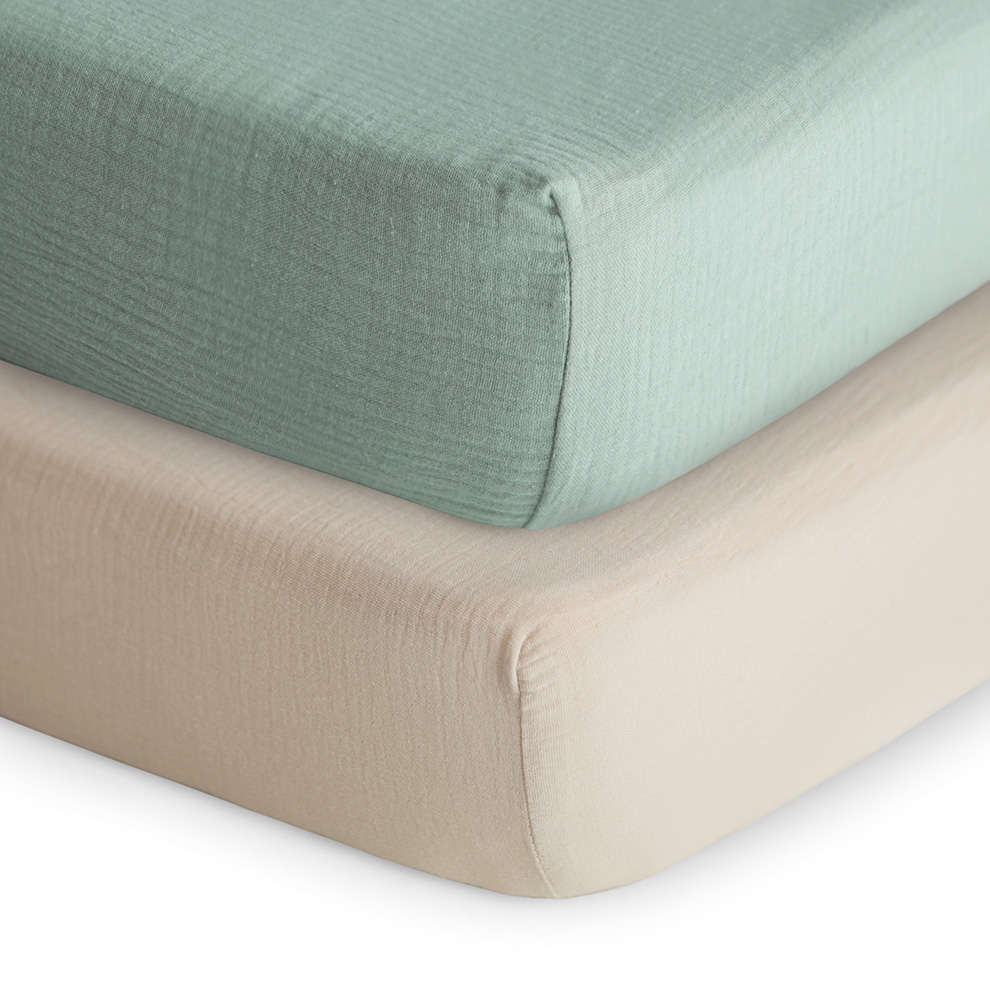 All changing pad covers come with two openings to accommodate safety belts