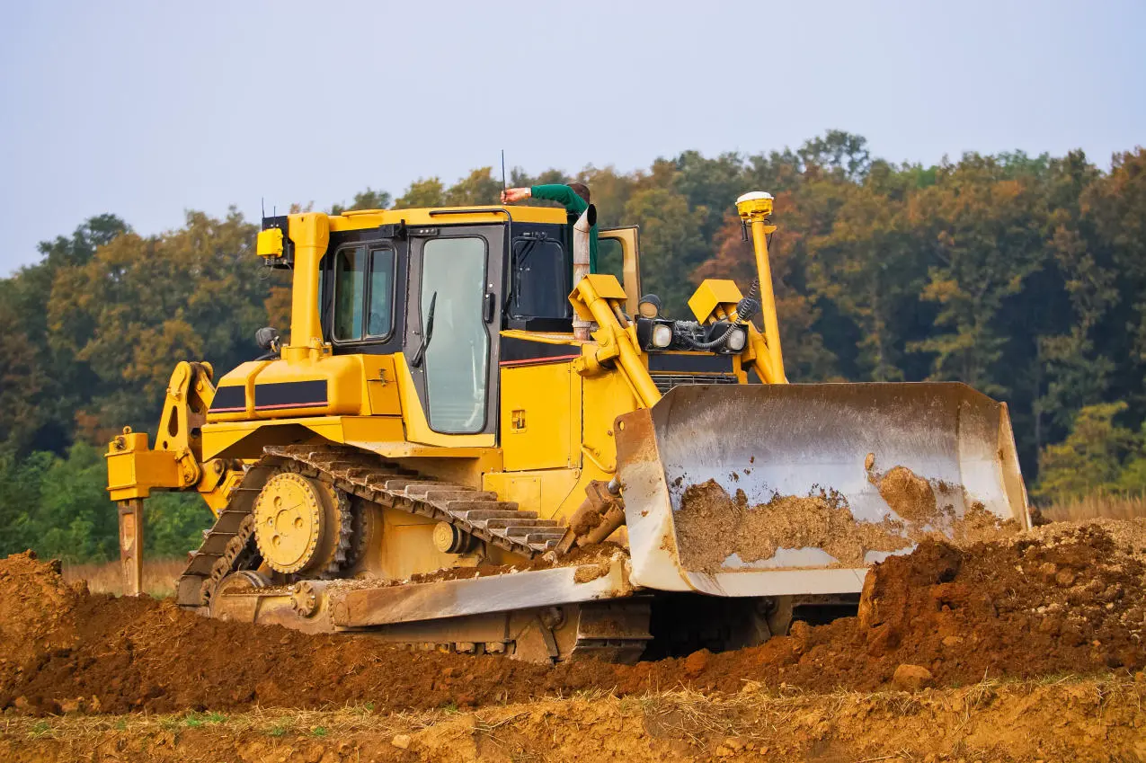 The Multi-Faceted Role of Bulldozers in Modern Urban Construction