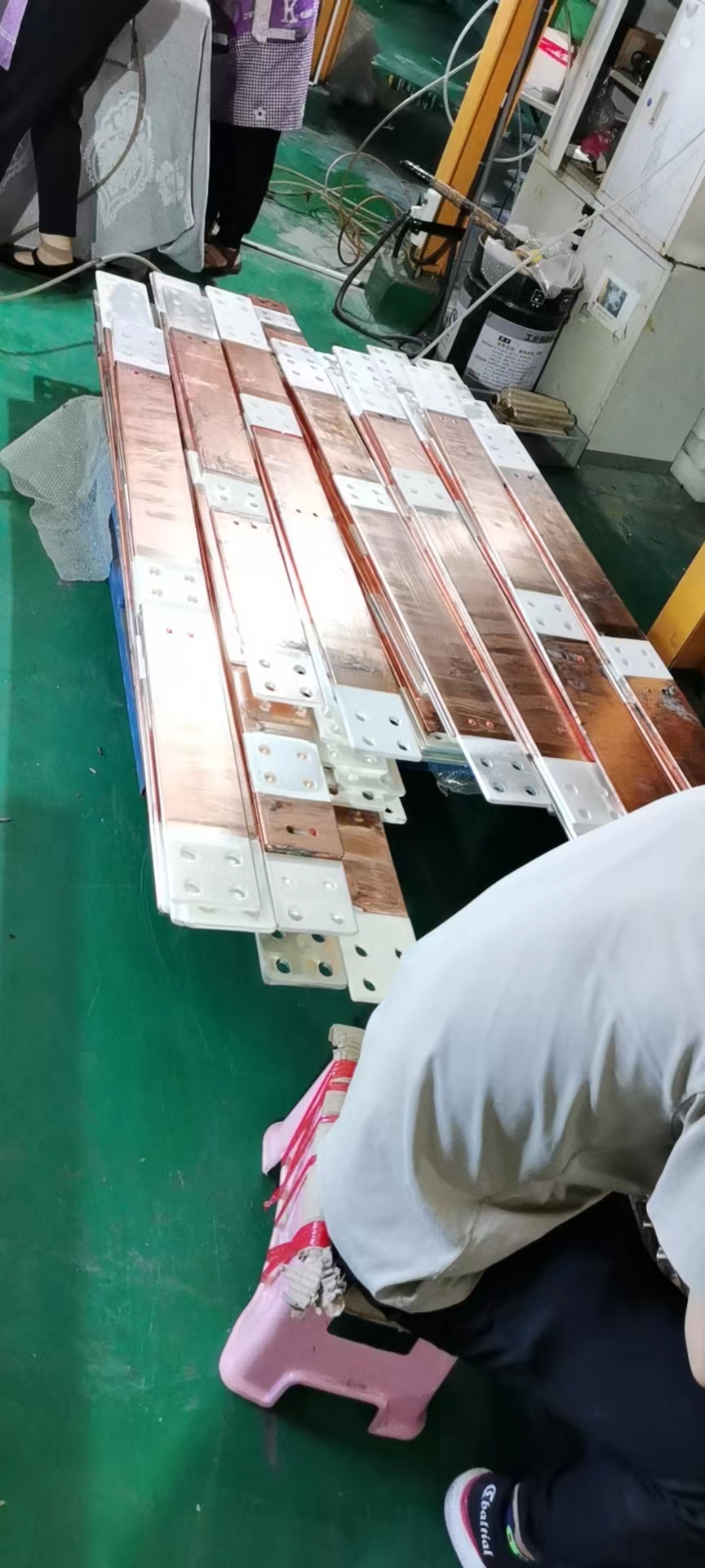 How are conductive busbars plated?