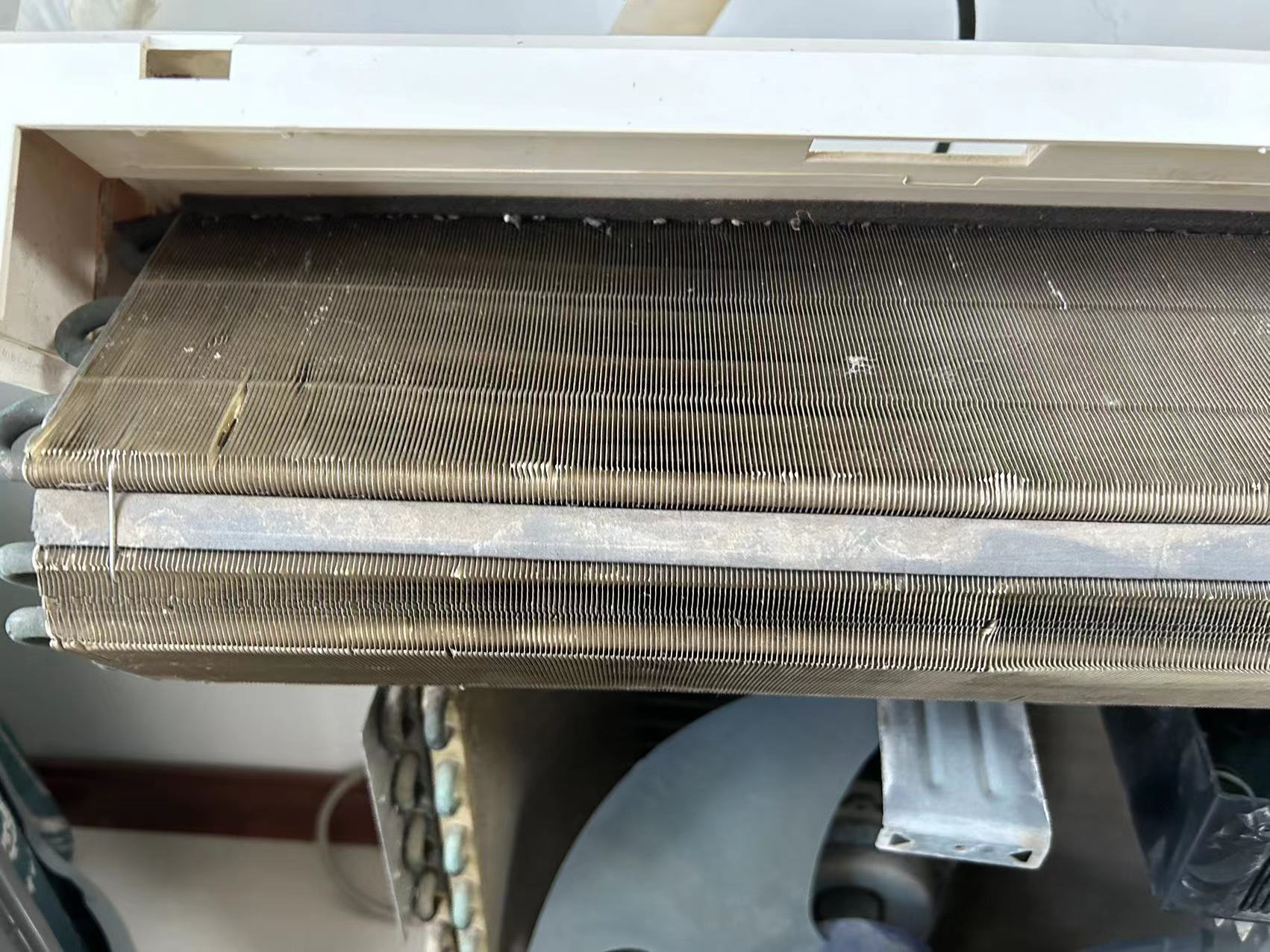 Do you know why filled with hot melt adhesive or sponge in evaporator?