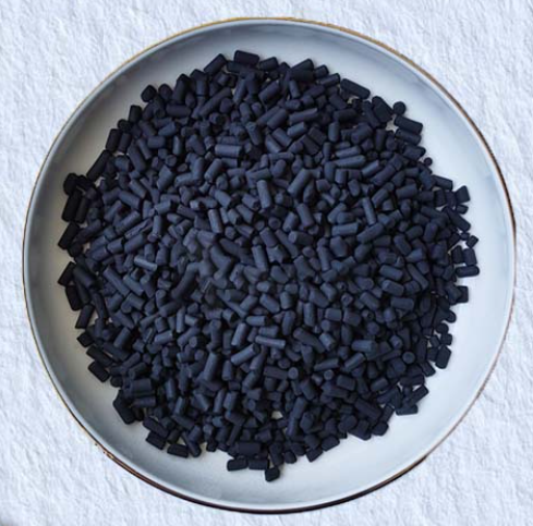Heap leaching of activated carbon pellets impregnated with sodium hydroxide